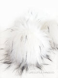 Snowy Owl Pom *White color with spots of cream and black tips *Long length fur (approximately 2-3") *Full look and soft feel