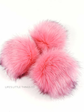 Melon Pom A watermelon pink with black tips Medium length fur (approximately 2") Very full pom Luxurious and amazingly soft feel