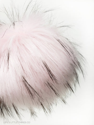 A fun, modern touch to your knitwear.  Make a STATEMENT with a faux fur poof.  Each pom is handmade with high quality faux fur (vegan). Price is for 1 Ballerina Faux Fur Pom Pom