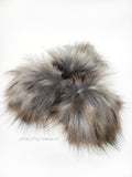 A fun, modern touch to your knitwear.  Make a STATEMENT with a faux fur poof.  Each pom is handmade with high quality faux fur (vegan). Price is for 1 Moonlight Faux Fur Pom Pom