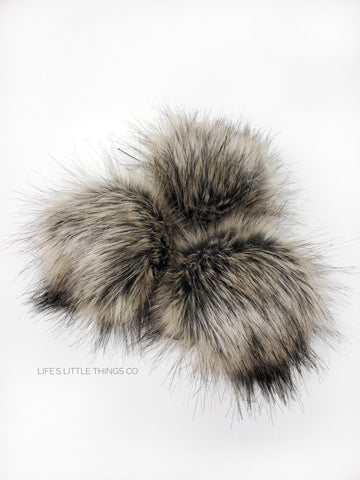 A fun, modern touch to your knitwear.  Make a STATEMENT with a faux fur poof.  Each pom is handmade with high quality faux fur (vegan). Price is for 1 Teddy Faux Fur Pom Pom