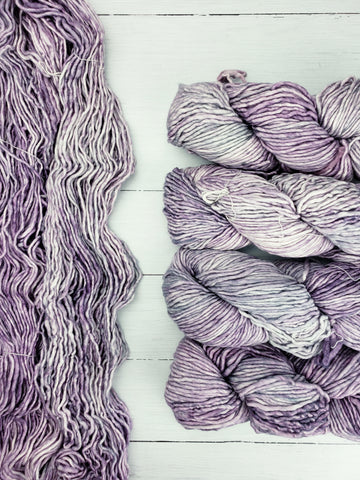 Thick and lofty superwash Merino is soft as ever and alive with vivid, multi-layered hues enough to lighten any room.  The perfect size for quick but not too heavy projects.  This is a single ply yarn.