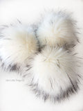 A fun, MODERN touch to your knitwear. Make a STATEMENT with a faux fur poof. Each pom is handmade with high quality faux fur (vegan). 3 sizes available with 2 nylon strings or a snap.  Permanent or detachable pom poms. Use for hat toppers, scarf ends, key chains, purse bling, headbands...options are limitless