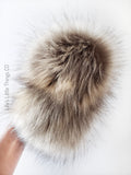 A fun, MODERN touch to your knitwear. Make a STATEMENT with a faux fur poof. Each pom is handmade with high quality faux fur (vegan). 3 sizes available with 2 nylon strings or a snap.  Permanent or detachable pom poms. Use for hat toppers, scarf ends, key chains, purse bling, headbands...options are limitless