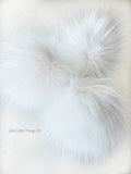 A fun, MODERN touch to your knitwear. Make a STATEMENT with a faux fur poof. Each pom is handmade with high quality faux fur (vegan). 3 sizes available with 2 nylon strings or a snap.  Permanent or detachable pom poms. Use for hat toppers, scarf ends, key chains, purse bling, headbands...options are limitless