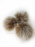 A fun, MODERN touch to your knitwear. Make a STATEMENT with a faux fur poof. Each pom is handmade with high quality faux fur (vegan). 3 sizes available with 2 nylon strings or a snap.  Permanent or detachable pom poms. Use for hat toppers, scarf ends, key chains, purse bling, headbands...options are limitless