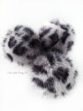 A fun, modern touch to your knitwear.  Make a STATEMENT with a faux fur poof.  Each pom is handmade with high quality faux fur (vegan). Price is for 1 Silver Cheetah Faux Fur Pom Pom