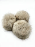 A fun, modern touch to your knitwear.  Make a STATEMENT with a faux fur poof.  Each pom is handmade with high quality faux fur (vegan).