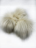 A fun, modern touch to your knitwear.  Make a STATEMENT with a faux fur poof.  Each pom is handmade with high quality faux fur (vegan).