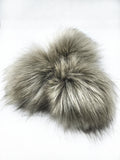 A fun, modern touch to your knitwear.  Make a STATEMENT with a faux fur poof.  Each pom is handmade with high quality faux fur (vegan).