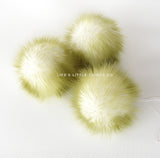 Kiwi Pom *White center and olive green tips *Medium length fur (approximately 2") *Full and soft feel 