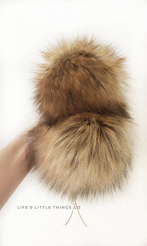 Toffee Pom *Brown, beige, tan variations throughout with single black furs *EVERY POM is UNIQUE *Long length fur (approximately 2-2.5") *Full look and soft feel
