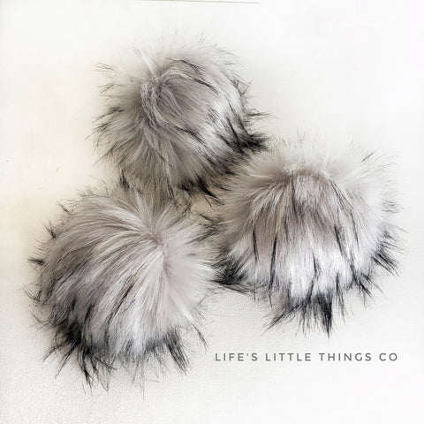 Platinum Pom *Grey/silver in color with light grey tufts with black tips. *Medium length fur (approximately 2" - 3") *Luxurious and amazingly soft feel 