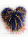 Blue Fire Pom Dark, royal blue color throughout with tufts of red and yellow tips *Long length fur (approximately 3") *Very full pom *Luxurious and amazingly soft feel