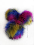 Mardi Gras Pom *Patches of blue, pink and yellow throughout.  EACH POM is UNIQUE! *Long length fur (approximately 2.5") *Very full pom *Luxurious and amazingly soft feel