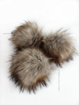Fossil Pom *Light grey center to brown ends and black tips *Long length fur (approximately 2.5") *Very full pom *Luxurious and amazingly soft feel