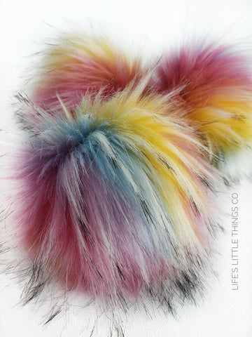 Rainbow pom pom Pink, yellow, blue, purple, orange with tufts of white with black tips Long length fur (approximately 3") Very full pom Luxurious and amazingly soft feel