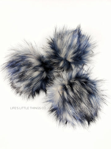 Chilled Pom Blue, light blue, white throughout with black tips. No two poms are alike! Medium length fur (approximately 2.5") Luxurious and amazingly soft feel