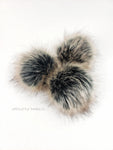 Toasted Mallow Pom Black center to beige ends with black tips Medium length fur (approximately 1.5" - 2") Full look