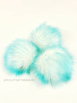 Iced Aqua Pom White center and aqua tips Medium length fur (approximately 2") Full and soft feel