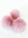 Bella Faux Fur Pom Solid warm pink color throughout Medium length fur (approximately 1.5" - 2") Luxurious and amazingly soft feel