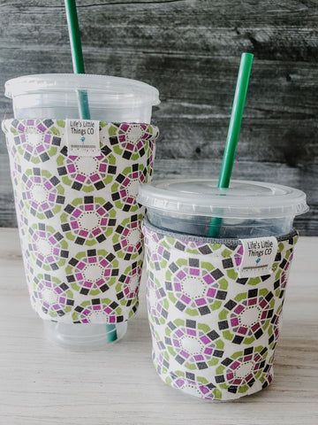 Heptagon & Squares Iced Drink Snug. Tired of sweating iced drink cups?  Or ice just melting too fast in your cold drink?   Insulate your cup with a modern, stylish cup snug.  Keep your coffee cold, hands warm and water rings off the table.  It may also be used on hot cups.