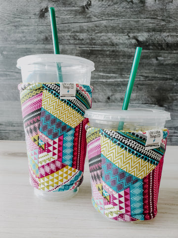 Bright Geometric Iced Drink Snug. Tired of sweating iced drink cups?  Or ice just melting too fast in your cold drink?   Insulate your cup with a modern, stylish cup snug.  Keep your coffee cold, hands warm and water rings off the table.  It may also be used on hot cups.