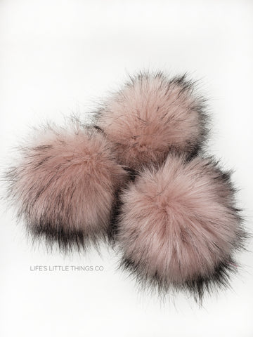 A fun, modern touch to your knitwear.  Make a STATEMENT with a faux fur poof.  Each pom is handmade with high quality faux fur (vegan). Price is for 1 Alyssum Faux Fur Pom Pom