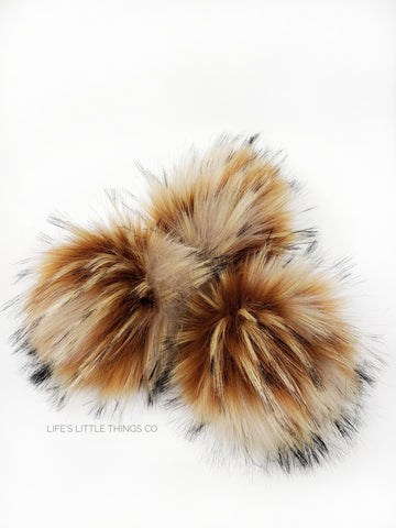 A fun, modern touch to your knitwear.  Make a STATEMENT with a faux fur poof.  Each pom is handmade with high quality faux fur (vegan). Price is for 1 GInger Faux Fur Pom Pom