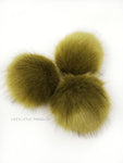 A fun, modern touch to your knitwear.  Make a STATEMENT with a faux fur poof.  Each pom is handmade with high quality faux fur (vegan). Price is for 1 Lemongrass Faux Fur Pom Pom