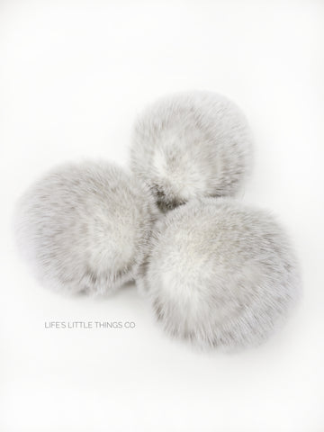 A fun, modern touch to your knitwear.  Make a STATEMENT with a faux fur poof.  Each pom is handmade with high quality faux fur (vegan). Price is for 1 Snow Fox Faux Fur Pom Pom