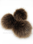 A fun, modern touch to your knitwear.  Make a STATEMENT with a faux fur poof.  Each pom is handmade with high quality faux fur (vegan). Price is for 1 Java Faux Fur Pom Pom