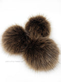 A fun, modern touch to your knitwear.  Make a STATEMENT with a faux fur poof.  Each pom is handmade with high quality faux fur (vegan). Price is for 1 Java Faux Fur Pom Pom
