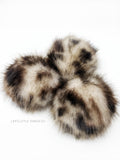 A fun, modern touch to your knitwear.  Make a STATEMENT with a faux fur poof.  Each pom is handmade with high quality faux fur (vegan). Price is for 1 Ocelot Faux Fur Pom Pom