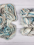 Handspun from handpainted merino tops, Serpentina is a truly artisanal product. Each skein is unique, and the colors are totally random -- they will not stack or pool. The ultra-soft superwash merino in a quick-knit gauge calls for next-to-the-skin wear like cowls and hats. 