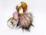 Take the guessing game out of yarn and pom matching from your device.  Bundles have a coordinating pom and yarn already picked out for you.  You are now ready to knit or crochet up a beanie!  No more trying to match yarns and poms!  