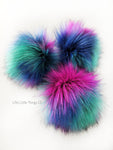 A fun, modern touch to your knitwear.  Make a STATEMENT with a faux fur poof.  Each pom is handmade with high quality faux fur (vegan). Price is for 1 Peacock Faux Fur Pom Pom