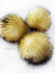 A fun, modern touch to your knitwear.  Make a STATEMENT with a faux fur poof.  Each pom is handmade with high quality faux fur (vegan). Price is for 1 Goldfinch Faux Fur Pom Pom