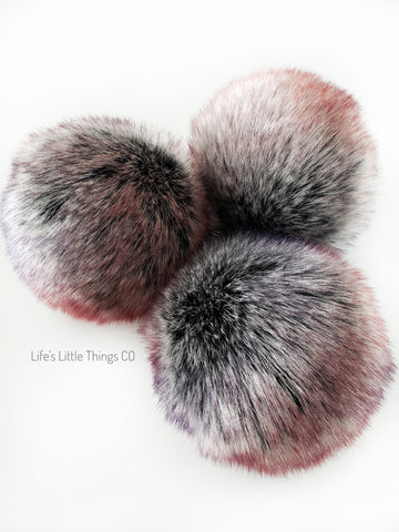 A fun, modern touch to your knitwear.  Make a STATEMENT with a faux fur poof.  Each pom is handmade with high quality faux fur (vegan). Price is for 1 Dynamo Faux Fur Pom Pom