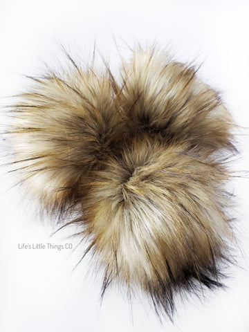 A fun, modern touch to your knitwear.  Make a STATEMENT with a faux fur poof.  Each pom is handmade with high quality faux fur (vegan). Price is for 1 Whiskey Faux Fur Pom Pom