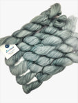 A heavenly blend of silk and kid mohair make this lace-weight yarn simply sublime to work with and decadently divine to wear. The silk imparts a subtle sheen while kid mohair lends a gorgeous halo to all your fine knitwear.