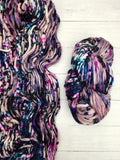 CLOUD from Indie Dyer, Threadhead Knits.  It's just that, clouds of Superwash Merino Wool.  Super-soft, super-warm, super-quick: this single ply yarn is hand-dyed in small batches.