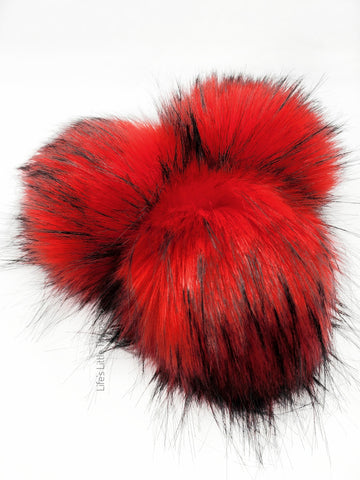 A fun, modern touch to your knitwear.  Make a STATEMENT with a faux fur poof.  Each pom is handmade with high quality faux fur (vegan).